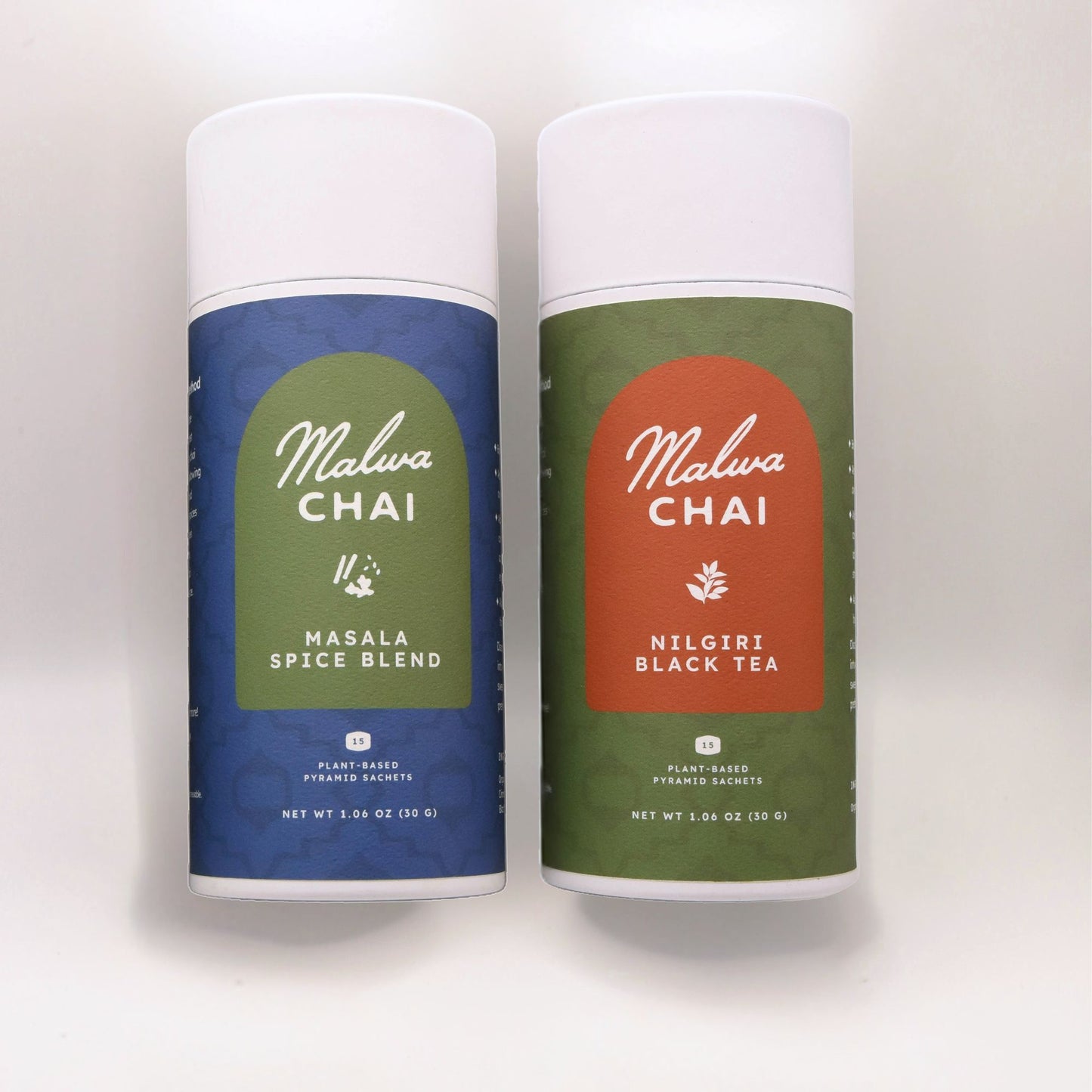 Two containers of Malwa Chai tea on a white background
